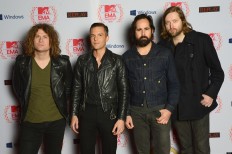FRANKFURT AM MAIN, GERMANY - NOVEMBER 11: (EXCLUSIVE COVERAGE) (L-R) Dave Keuning, Brandon Flowers, Ronnie Vannucci Jr.and Mark Stoermer of The Killers attend the MTV EMA's 2012 at Festhalle Frankfurt on November 11, 2012 in Frankfurt am Main, Germany. (Photo by Dave Hogan/MTV 2012/Getty Images for MTV)